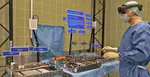 Multi-Camera AR Guidance System for Surgical Instrument Handling and Assembly: Investigating Workload and Efficiency